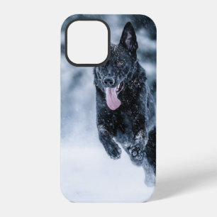 Black German Shepherd in snow Duvet Cover