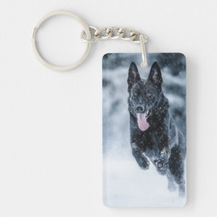Black German Shepherd in snow Duvet Cover Keychain