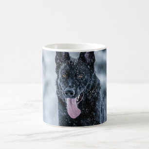 Black German Shepherd in snow Duvet Cover Magic Mug