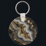 Black Gold Agate Geode Luxury Marble Keychain<br><div class="desc">Mesmerizing black and charcoal agate with flowing bands of soft gray and creamy white,  dramatically framed and veined in molten liquid gold. This opulent,  high-contrast geode design exudes modern luxury,  sophistication and powerful elegance perfect for those who love dark,  glamorous mineral aesthetics.</div>