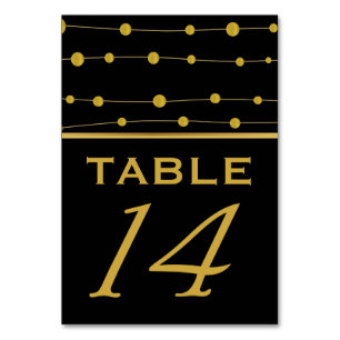 Black, gold foil beads modern wedding table number