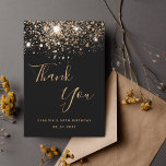 Black gold glitter elegant script birthday thank you card<br><div class="desc">A thank you card for a 50th (or any age) birthday. A black background color,  decorated with faux gold glitter. On front large dark golden colored hand lettered script and the text: Thank You,  your text,  title and a date. 
Back: Template for Your thank you note and name.</div>