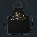 Black & Gold Hairstylist Salon Name Apron<br><div class="desc">Black & Gold Hairstylist Salon Name Black apron . Design Features Calligraphy ''Hair'' in gold colour , pair of silver hairdressers scissors on a black background. Personalize with a name or salon name.</div>