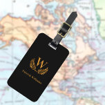 Black gold laurel wreath monogram initials name luggage tag<br><div class="desc">A classic black background. Golden coloured letters. Personalize and add your family monogram initial and name,  your contact information on the back. For both him and her.</div>
