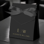 Black Gold Modern Minimalist Monogram Name Favor Box<br><div class="desc">Elevate your event's favours with our Classic Elegant Modern Minimalist Monogram Favour Box. Meticulously designed, these favour boxes seamlessly blend timeless sophistication with contemporary minimalism, making them a stylish and memorable addition to your celebration. Crafted with precision and attention to detail, these favour boxes are more than just containers; they...</div>
