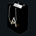 Black Gold Modern Script Girly Monogram Name Medium Gift Bag<br><div class="desc">Black and Gold Simple Script Monogram Name Gift Bag. This makes the perfect sweet 16 birthday,  wedding,  bridal shower,  anniversary,  baby shower or bachelorette party gift bag for someone that loves glam luxury and chic styles.</div>