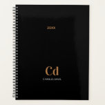 Black gold monogram initials 2025 planner<br><div class="desc">Stay stylishly organized with the "Black Gold Monogram 2025 Planner." This sleek and modern planner combines timeless black with elegant gold accents, creating a sophisticated design that’s perfect for personal or professional use. The customizable monogram feature allows you to add your initials, making it uniquely yours or an ideal gift...</div>