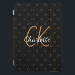 Black gold monogram initials name script elegant iPad pro cover<br><div class="desc">Personalize and add your monogram letters,  initials and name.  The monogram initials as a pattern on the background.   A classic chic black background colour.  White and golden coloured letters.</div>