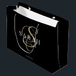 Black Gold Monogram Personalized Bridesmaid Large Gift Bag<br><div class="desc">This black personalized bridesmaid gift bag features personalized bridesmaid's name,  calligraphy monogram in gold colour and wedding date. Change background and fonts colours easily if you like.</div>