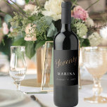 Black gold name script 70th birthday wine label<br><div class="desc">Black background. Seventy is written with a faux gold script.  Personalize and add a name and date.  White text.</div>