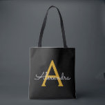 Black Gold Name White Girly Script Monogram Modern Tote Bag<br><div class="desc">Black and Gold Elegant Add Your Own Name Monogram Book Bag. This Book Bag can be customized to include your initial and first name and given as a gift for Christmas,  Sweet 16 Birthday,  Bridal Shower or a Wedding.</div>