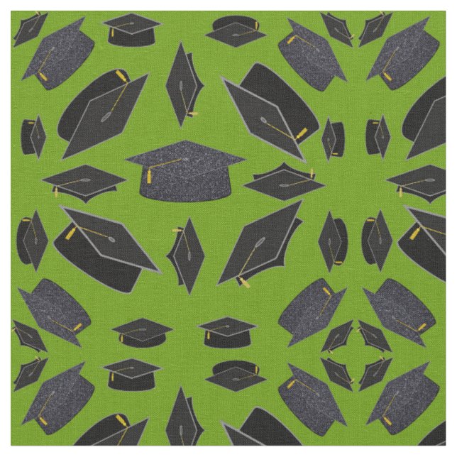 Black Graduation Caps Thrown Over Green Grass Fabric (Close Up)