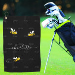 Black happy bumble bees summer fun humour monogram golf towel<br><div class="desc">Decorated with happy, smiling yellow and black bumble bees. A chic black background. Personalize and add a name and your monogram, initials. The monogram in grey as a pattern in the background. The name is written in white with a modern hand lettered stylie script with swashes. To keep the swashes...</div>