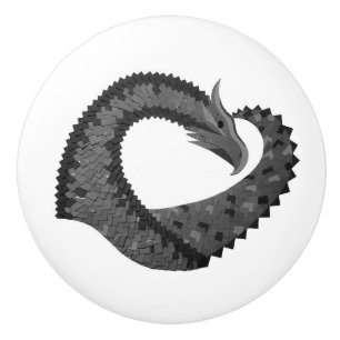 Black heart dragon on white ceramic knob