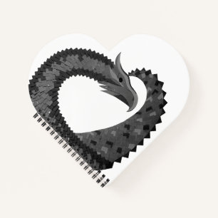 Black heart dragon on white notebook