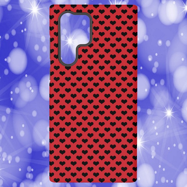 Black Heart Pattern Red Background Samsung Galaxy S22 Ultra Case (A phone case with a pattern of black hearts on a red background)
