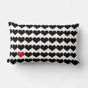 Black hearts and a single red heart lumbar pillow