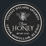 Black Honey Label White Vintage Bee<br><div class="desc">Personalize with your apiary name and address,  honey net weight and any honey descriptors (pure,  raw,  clover,  etc.). Vintage bee design in centre. White text and illustration on a black background. Common honey net weight conversions: 8oz (227g),  12oz (340g),  16oz (454g),  32oz (907g),  5lb (2.27kg).</div>