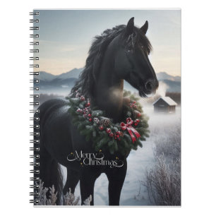 Black horse in the snow with Christmas wreath Notebook