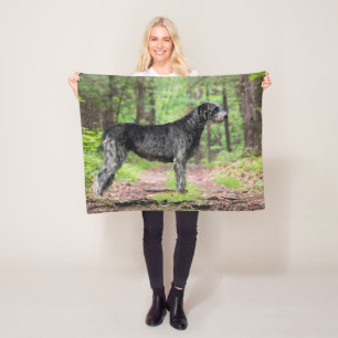 Black Irish Wolfhound Posing in the woods Fleece Blanket