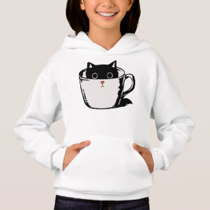 Black kitten with red nose hiding in a cup