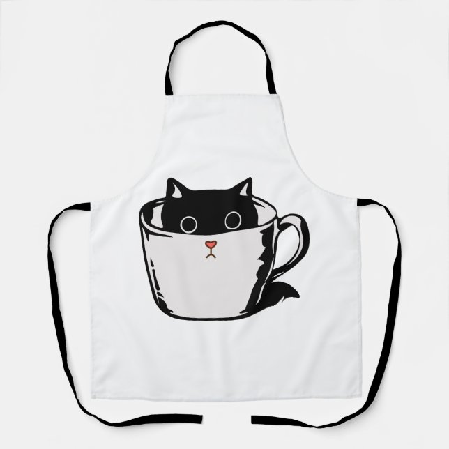 Black kitten with red nose hiding in a cup apron (Front)