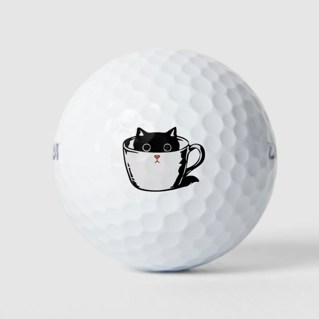 Black kitten with red nose hiding in a cup golf balls (Front)