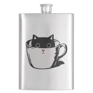 Black kitten with red nose hiding in a cup hip flask