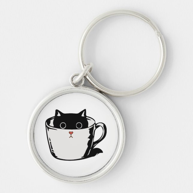 Black kitten with red nose hiding in a cup keychain (Front)