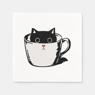 Black kitten with red nose hiding in a cup napkin