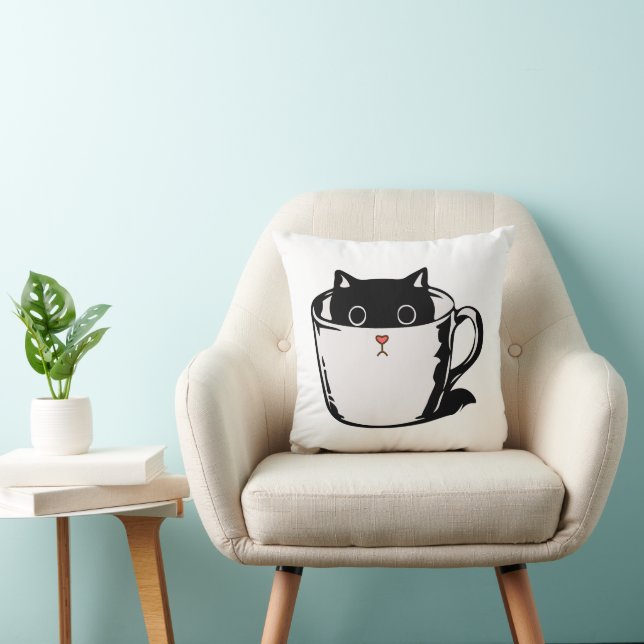 Black kitten with red nose hiding in a cup throw pillow (Chair)