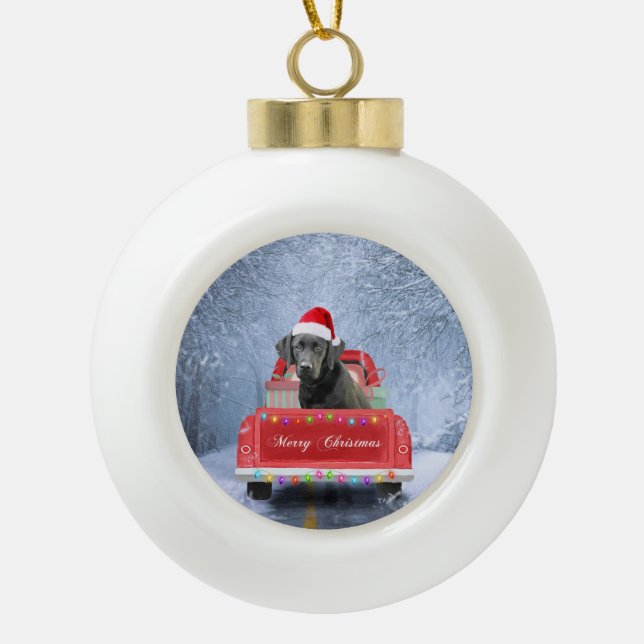 Black Labrador Dog in Snow sitting in Christmas Ceramic Ball Christmas Ornament (Front)
