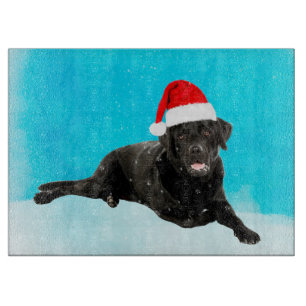 Black Labrador Dog Sitting in Snow Christmas Cutting Board