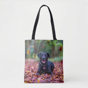 Black Labrador In Fall Leaves Tote Bag