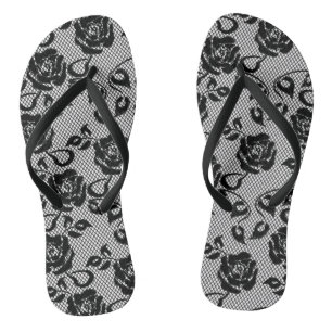 Black lace pattern on white background flip flops