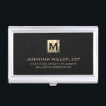 Black Leather Luxury Gold Initial Logo Business Card Holder<br><div class="desc">Simple modern luxury design with brushed metallic gold initial logo medallion with personalized name,  title,  company name or custom text below in classic block typography on a black leather textured background. Personalize for your custom use.</div>
