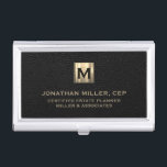 Black Leather Luxury Gold Initial Logo Business Card Holder<br><div class="desc">Simple modern luxury design with brushed metallic gold initial logo medallion with personalized name,  title,  company name or custom text below in classic block typography on a black leather textured background. Personalize for your custom use.</div>