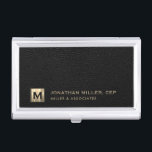 Black Leather Luxury Gold Initial Logo Business Card Holder<br><div class="desc">Simple modern luxury design with brushed metallic gold initial logo medallion with personalized name,  title,  company name or custom text below on a black leather textured background. Personalize for your custom use.</div>