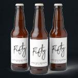 Black Lettering Fifty | 50th Birthday Party Beer Beer Bottle Label<br><div class="desc">This modern bottle label is perfect for a chic modern 50th birthday party. The design features black lettering " Fifty " with custom text. You can personalize the text and background colour. Matching invitation and party supplies are available at my shop BaraBomDesign. Thank you!</div>