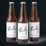Black Lettering Thirty | 30th Birthday Party Beer Bottle Label<br><div class="desc">This modern bottle label is perfect for a chic modern 30th birthday party. The design features black lettering " Thirty " with custom text. You can personalize the text and background colour. Matching invitation and party supplies are available at my shop BaraBomDesign. Thank you!</div>