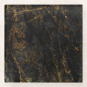 Black marble, golden veins, texture. glass coaster