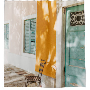Black metal chair near dor