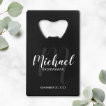 Black Modern Script Personalized Groomsmen Credit Card Bottle Opener<br><div class="desc">Add a personal touch to your wedding with personalized groomsmen credit card bottle opener. This bottle opener features personalized groomsmen's name in white modern script font style and monogram in light grey modern script font style as background with title and wedding date in white modern sans serif font style on...</div>