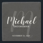 Black Modern Script Personalized Groomsmen Stone Coaster<br><div class="desc">Add a personal touch to your wedding with personalized groomsmen stone coaster. This coaster features personalized groomsmen's name in white modern script font style and monogram in light grey modern script font style as background with title and wedding date in white modern sans serif font style on black background. Also...</div>