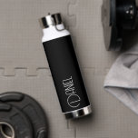 Black Modern Typography Personalized Water Bottle<br><div class="desc">Trendy,  vacuum insulated water bottle that features personalized name in white,  modern typography on a black background. Personalize bottle by editing name and replacing name with your own as desired. Perfect for a birthday gift,  wedding groomsman gift,  etc. Select your water bottle style. Select your water bottle style.</div>
