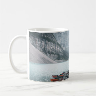 BLACK MOUNTAIN COVERED WITH SNOW UNDER GREY SKY COFFEE MUG