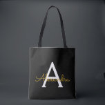 Black Name Gold Girly Script Monogram Modern Tote Bag<br><div class="desc">Black and Gold Elegant Add Your Own Name Monogram Book Bag. This Book Bag can be customized to include your initial and first name and given as a gift for Christmas,  Sweet 16 Birthday,  Bridal Shower or a Wedding.</div>
