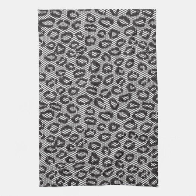 Black net lace with leopard pattern on white kitchen towel (Vertical)