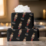 Black Nutcracker Red Soldier Christmas  Wrapping Paper<br><div class="desc">Make your presents stand out under the tree with our premium Black Nutcracker Red Soldier Christmas Wrapping Paper. The striking design,  showcasing handsome nutcracker soldiers in colourful uniform against a dramatic black backdrop,  adds a festive and stylish touch to your holiday gifts.</div>