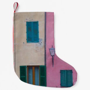 BLACK OUTDOOR SCONCE ON PINK PAINTED WALL SMALL CHRISTMAS STOCKING